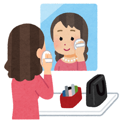お化粧する女性